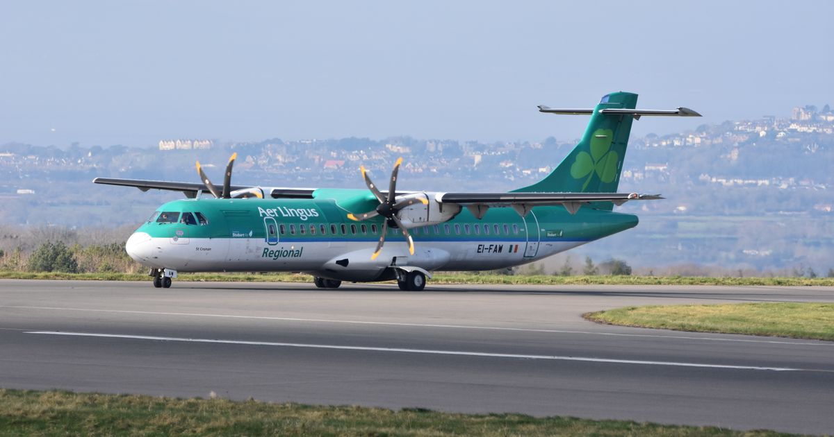 Aer Lingus plane taxiing on the runway before a transatlantic flight